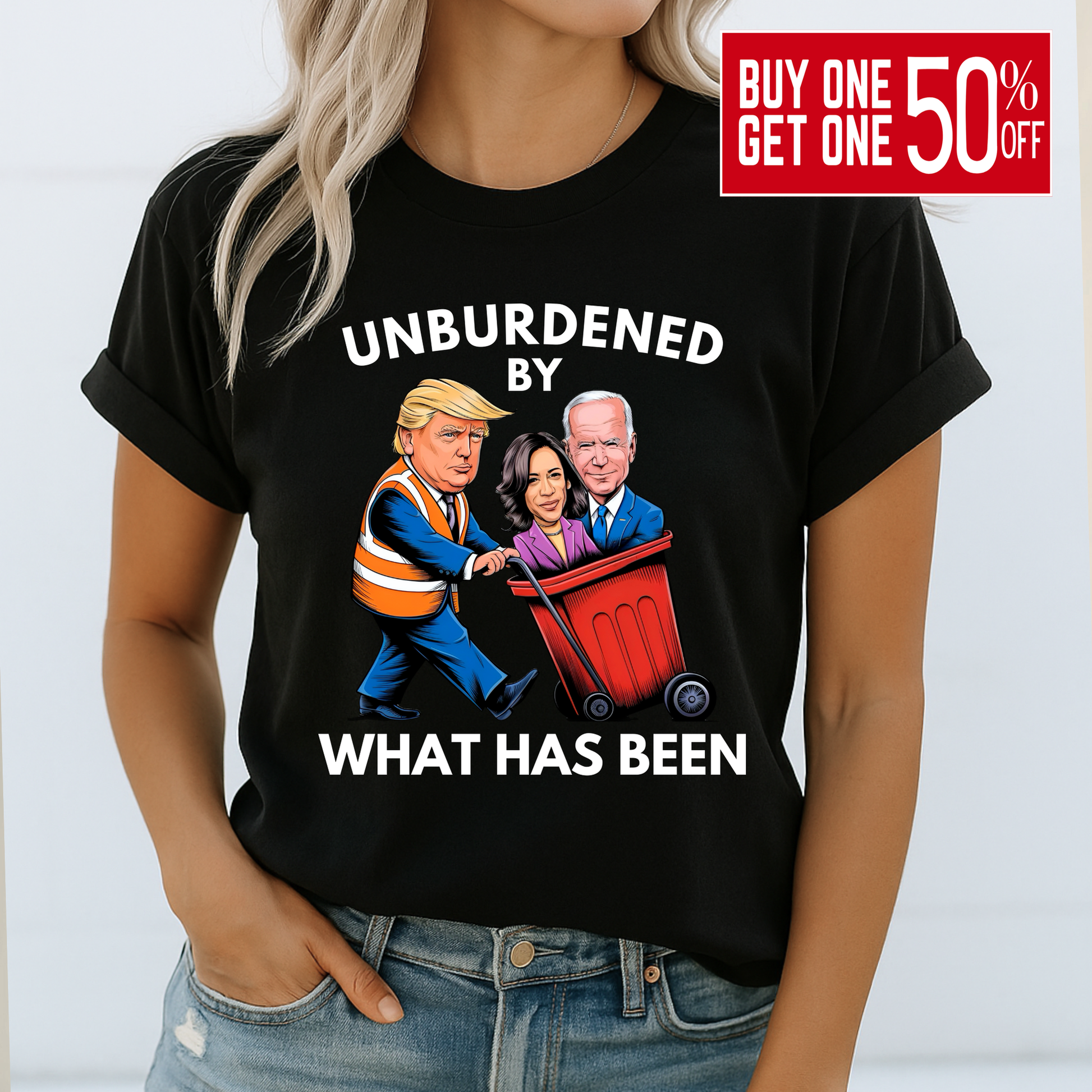 Woman wearing black shirt with anti-Biden Trump cartoon graphic – “Unburdened By What Has Been”
