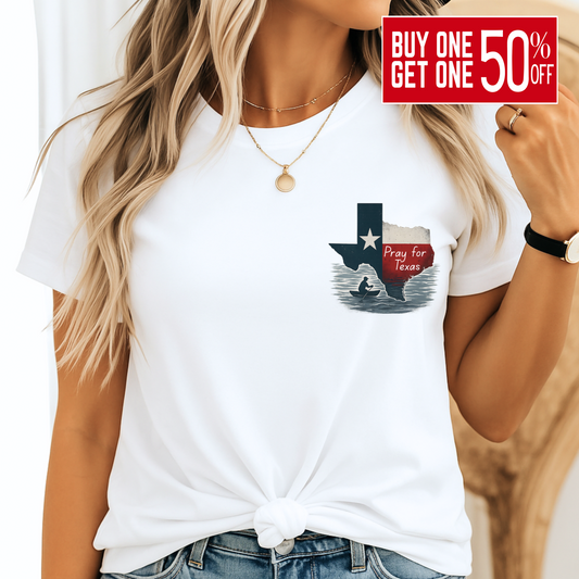 White “Pray for Texas” Christian t-shirt for women, with Texas flood relief graphic and knotted front, styled with denim shorts.