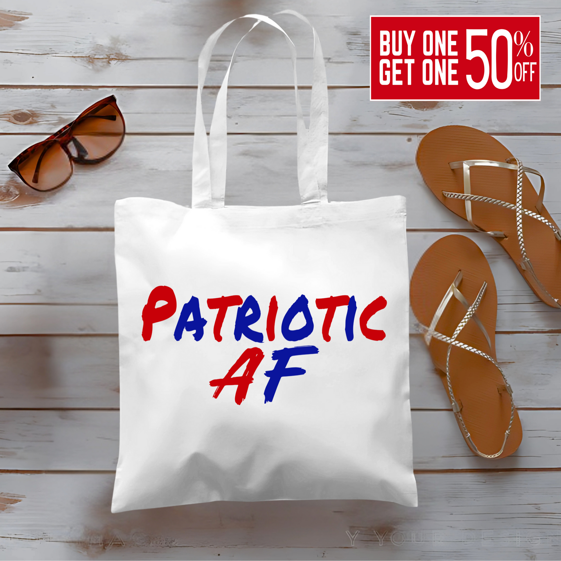 Woman holding canvas tote bag with bold red and blue 'Patriotic AF' text