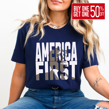 Woman in navy blue “America First” shirt, confident stance