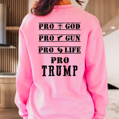 Woman wearing Pink sweatshirt with distressed USA flag and bold statement back print design.