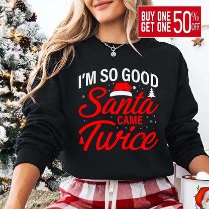 Woman wearing black “I’m So Good Santa Came Twice” Christmas sweatshirt

