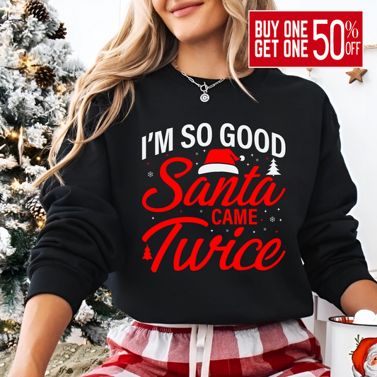 Woman wearing black “I’m So Good Santa Came Twice” Christmas sweatshirt

