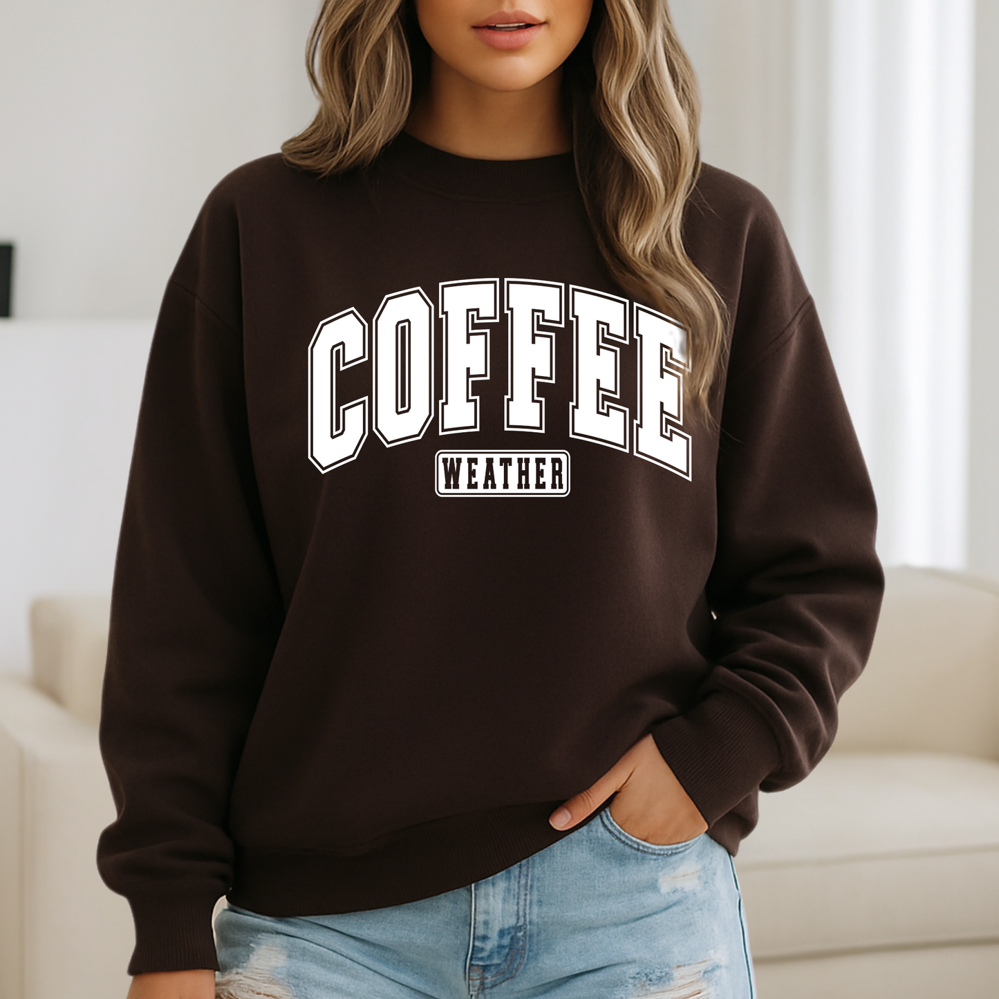 Woman in Brown crewneck with brown “Coffee Weather” text, cozy fall vibe
